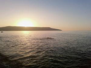 Coucher De Soleil Sur La Plage Bousfer